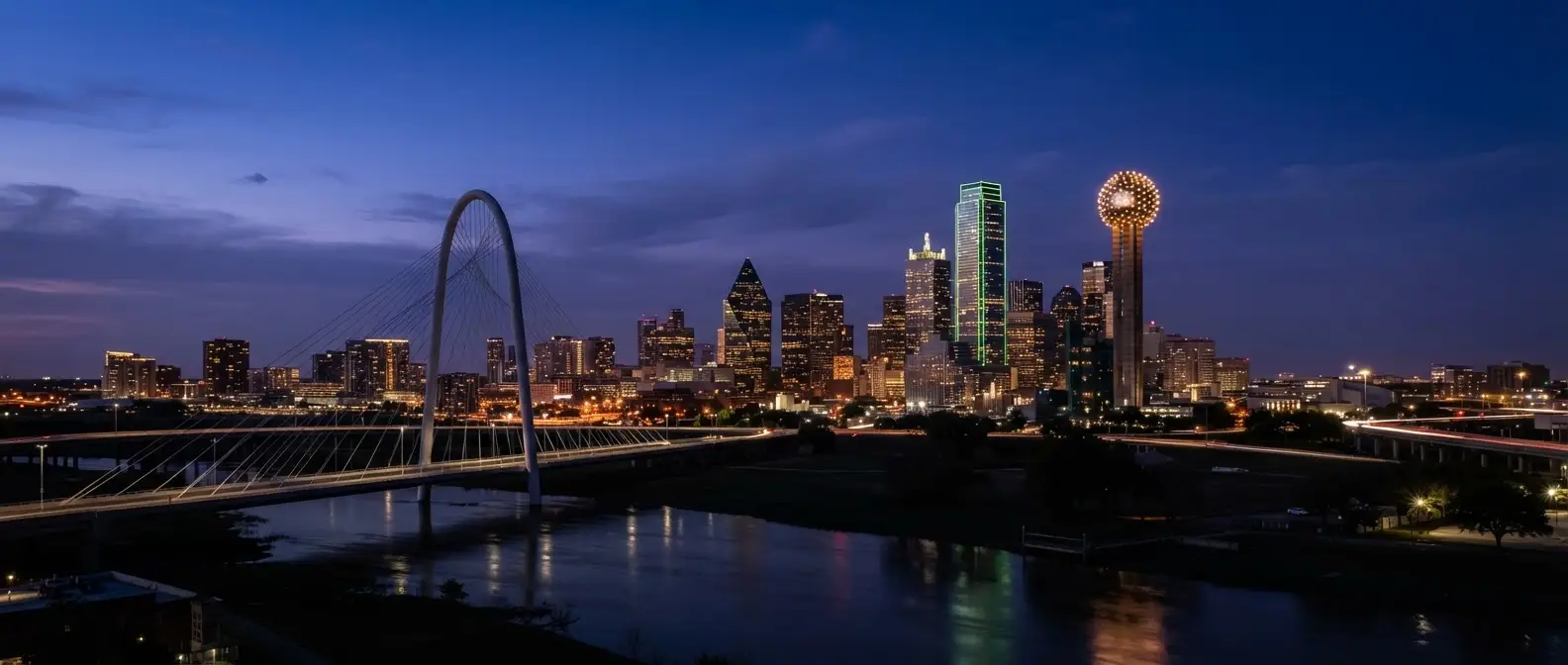 Dallas skyline at blue hour with Reunion Tower and lit-up skyscrapers